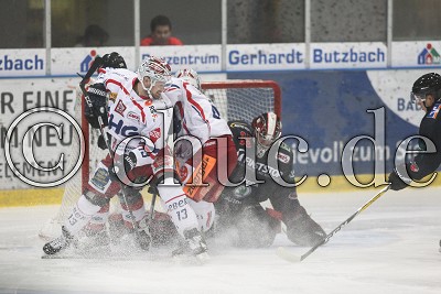 -13- Vincenz Mayer (Towerstars Ravensburg) und -92- Zack O'Brien (Towerstars Ravensburg) gegen -38- Dusan Frosch (Rote Teufel Bad Nauheim) und -35- Mikko R&auml;m&ouml; (Torwart Rote Teufel Bad Nauheim), in der DEL II - Rote Teufel EC Bad Nauheim gegen EHC Bayreuth Tigers - Foto &copy; A. Chuc